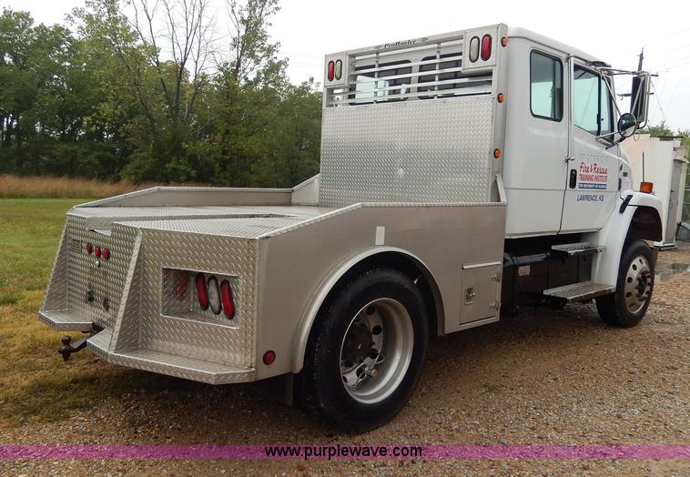 image for item I4302 2003 Freightliner FL70 semi truck