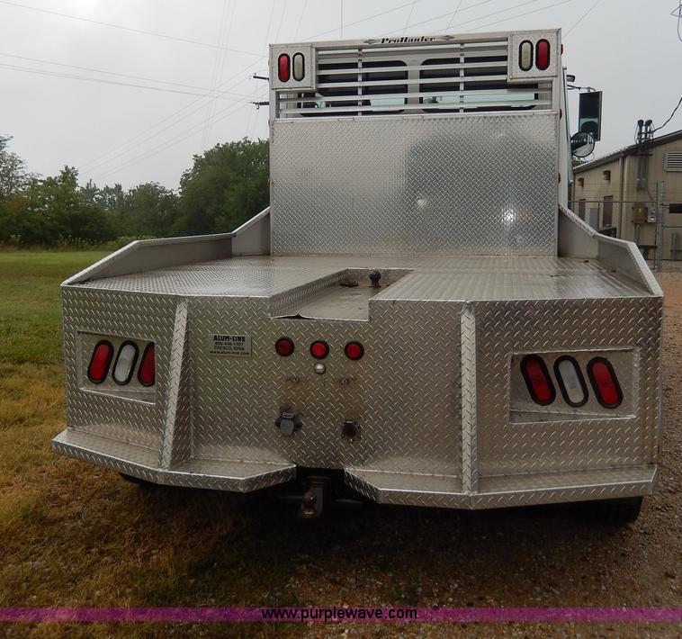 image for item I4302 2003 Freightliner FL70 semi truck