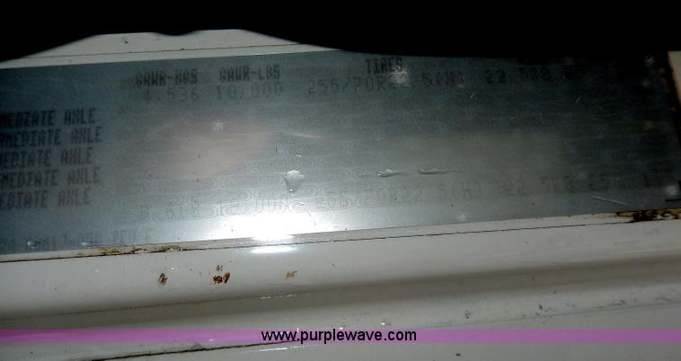 image for item I4302 2003 Freightliner FL70 semi truck