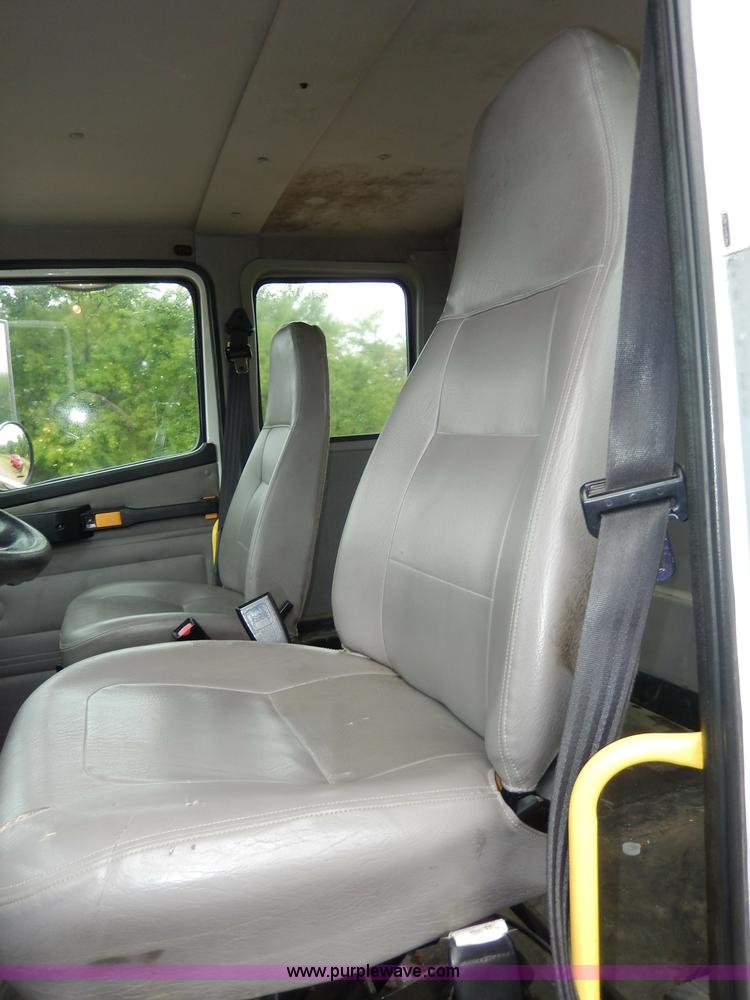 image for item I4302 2003 Freightliner FL70 semi truck