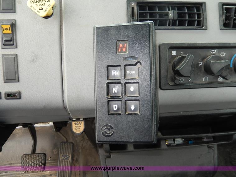 image for item I4302 2003 Freightliner FL70 semi truck