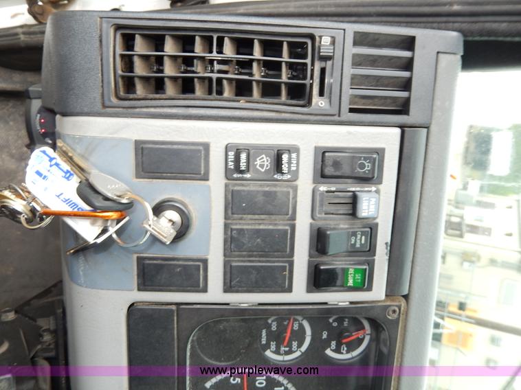 image for item I4302 2003 Freightliner FL70 semi truck