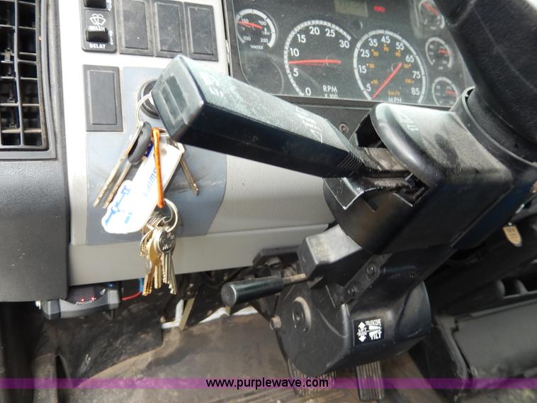 image for item I4302 2003 Freightliner FL70 semi truck