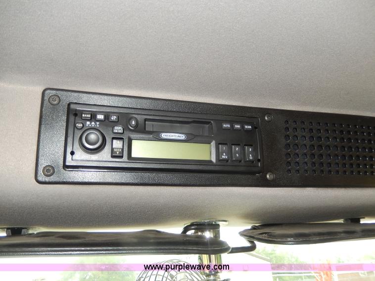 image for item I4302 2003 Freightliner FL70 semi truck