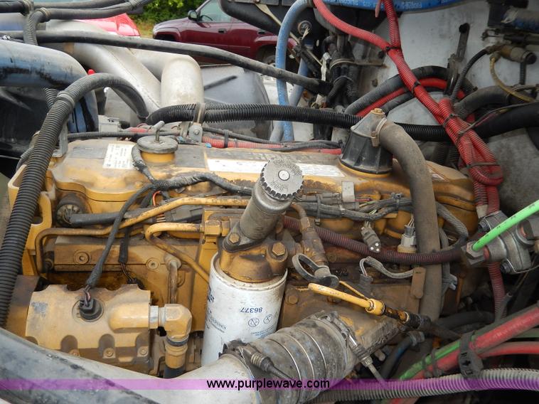 image for item I4302 2003 Freightliner FL70 semi truck