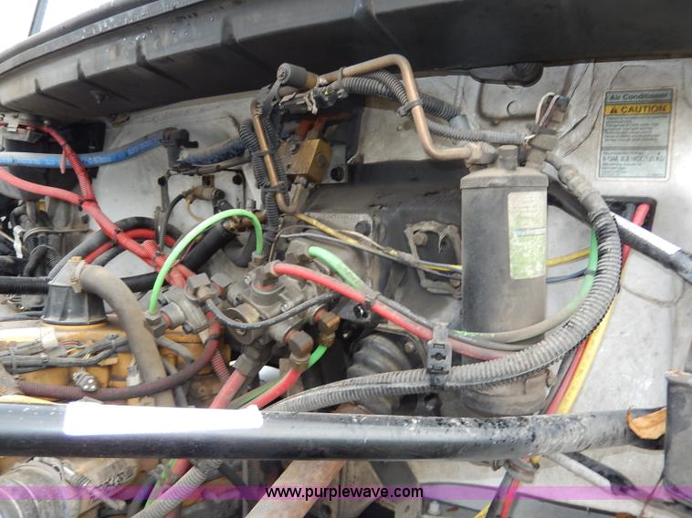 image for item I4302 2003 Freightliner FL70 semi truck