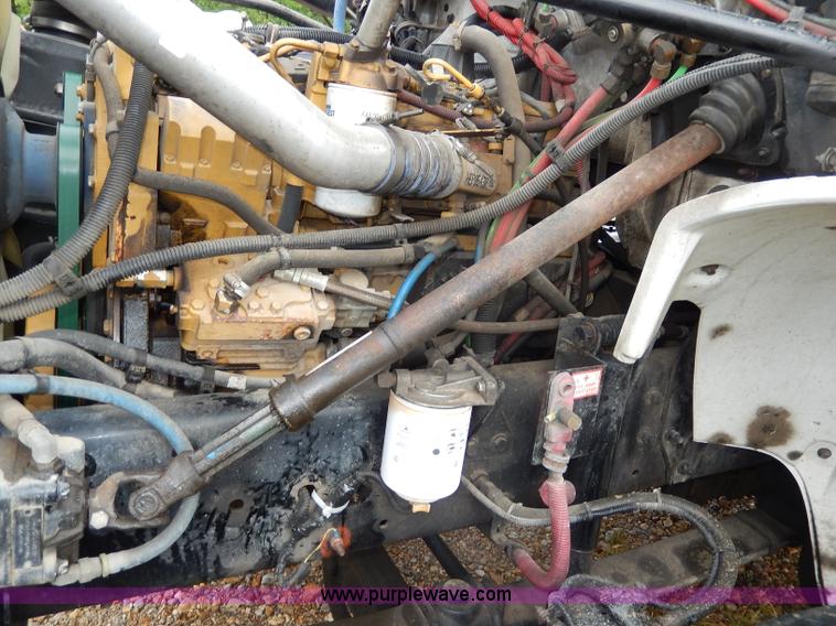 image for item I4302 2003 Freightliner FL70 semi truck