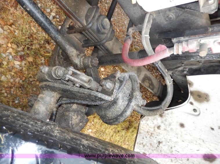 image for item I4302 2003 Freightliner FL70 semi truck