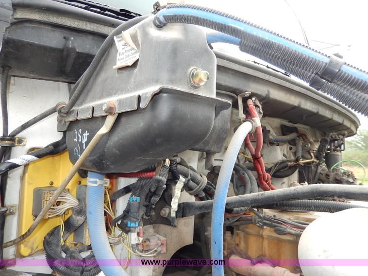 image for item I4302 2003 Freightliner FL70 semi truck