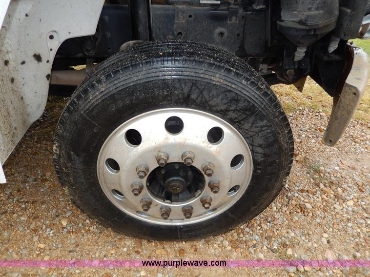 image for item I4302 2003 Freightliner FL70 semi truck