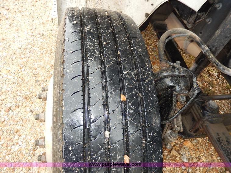 image for item I4302 2003 Freightliner FL70 semi truck