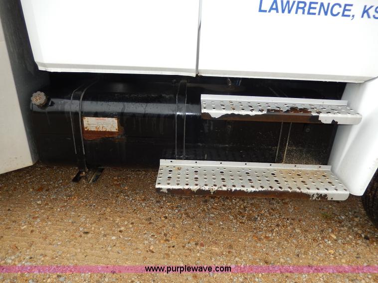 image for item I4302 2003 Freightliner FL70 semi truck