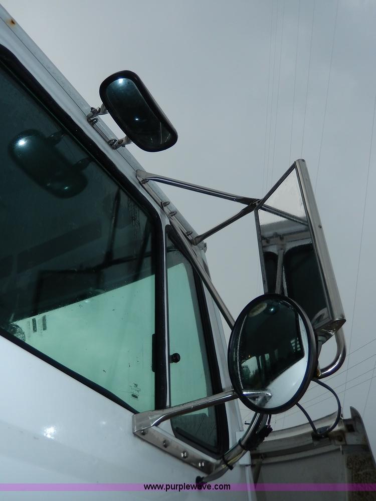 image for item I4302 2003 Freightliner FL70 semi truck