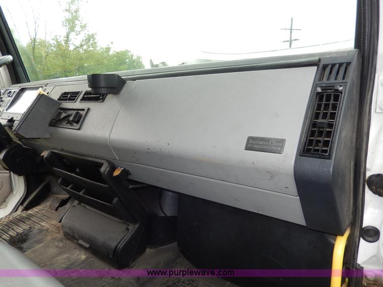 image for item I4302 2003 Freightliner FL70 semi truck