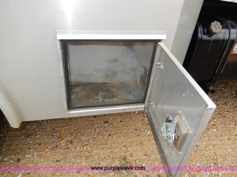 image for item I4302 2003 Freightliner FL70 semi truck