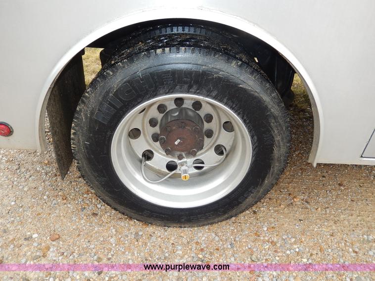 image for item I4302 2003 Freightliner FL70 semi truck