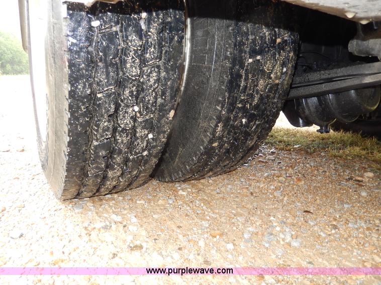 image for item I4302 2003 Freightliner FL70 semi truck