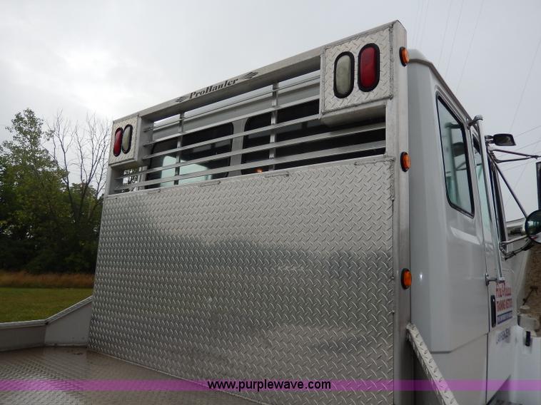 image for item I4302 2003 Freightliner FL70 semi truck