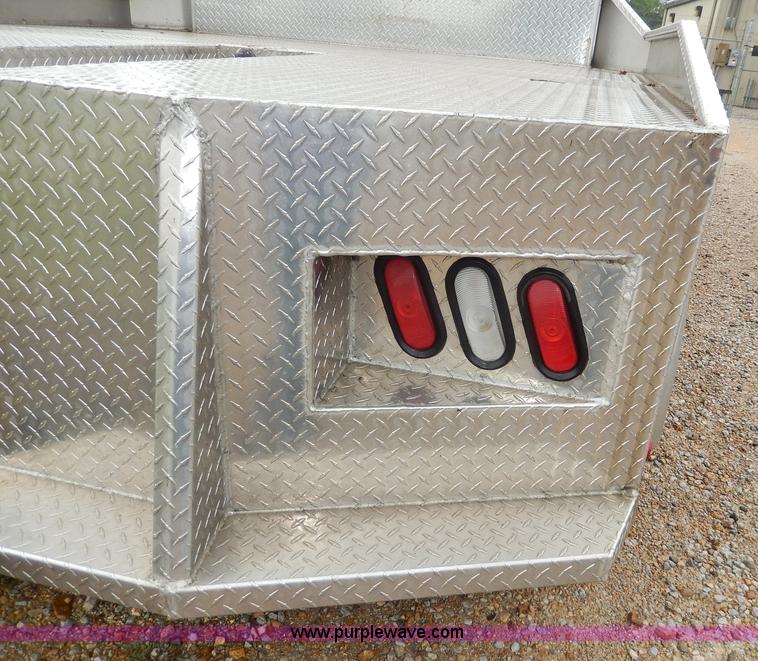 image for item I4302 2003 Freightliner FL70 semi truck