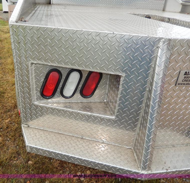 image for item I4302 2003 Freightliner FL70 semi truck