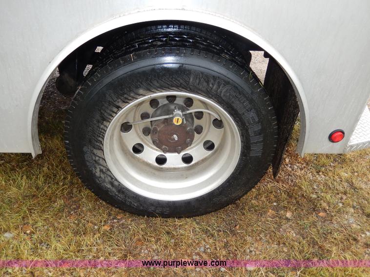 image for item I4302 2003 Freightliner FL70 semi truck