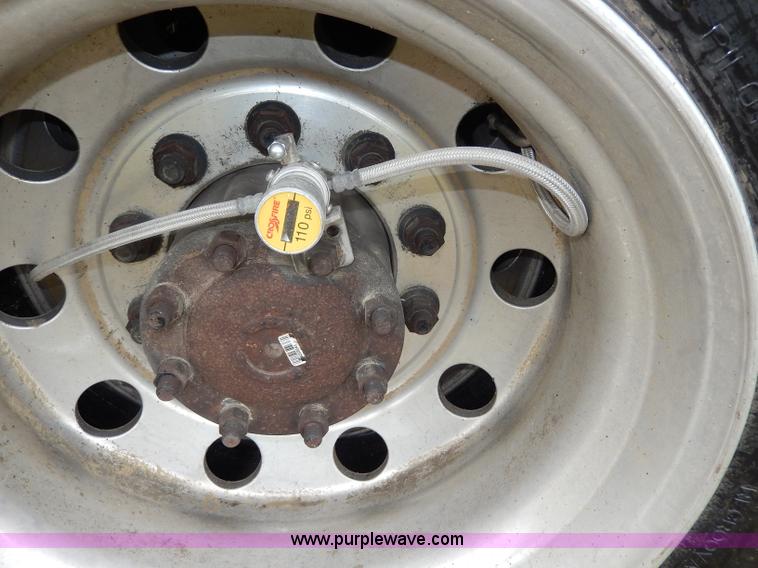 image for item I4302 2003 Freightliner FL70 semi truck