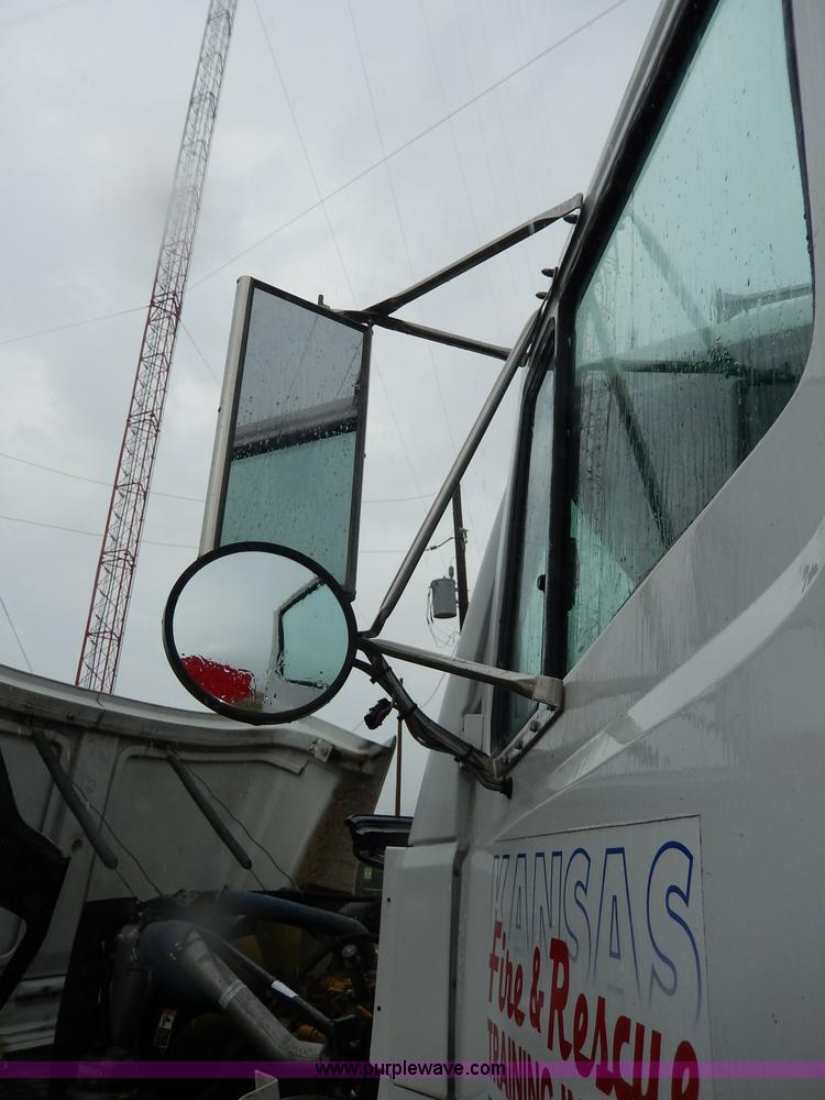 image for item I4302 2003 Freightliner FL70 semi truck