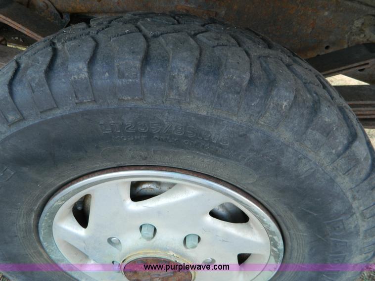 image for item D6033 1989 Ford F250 HD SuperCab flatbed truck