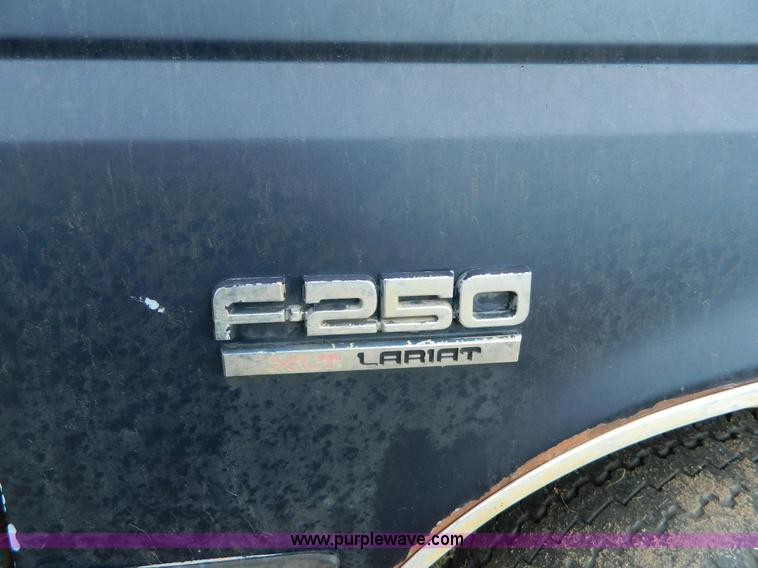 image for item D6033 1989 Ford F250 HD SuperCab flatbed truck