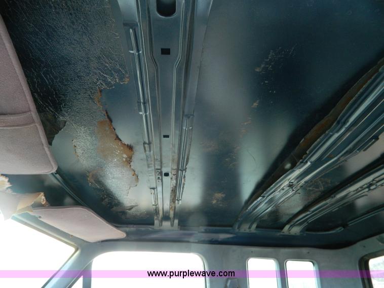 image for item D6033 1989 Ford F250 HD SuperCab flatbed truck