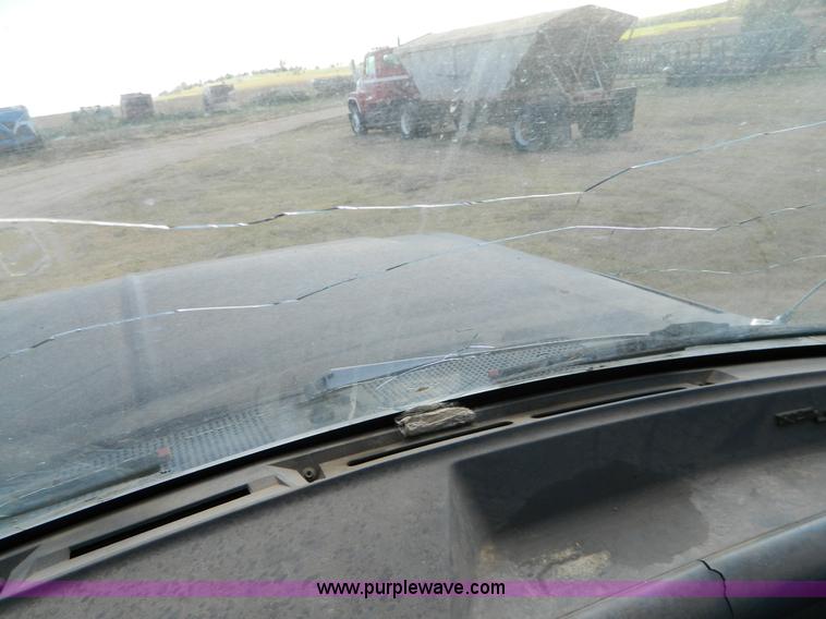 image for item D6033 1989 Ford F250 HD SuperCab flatbed truck