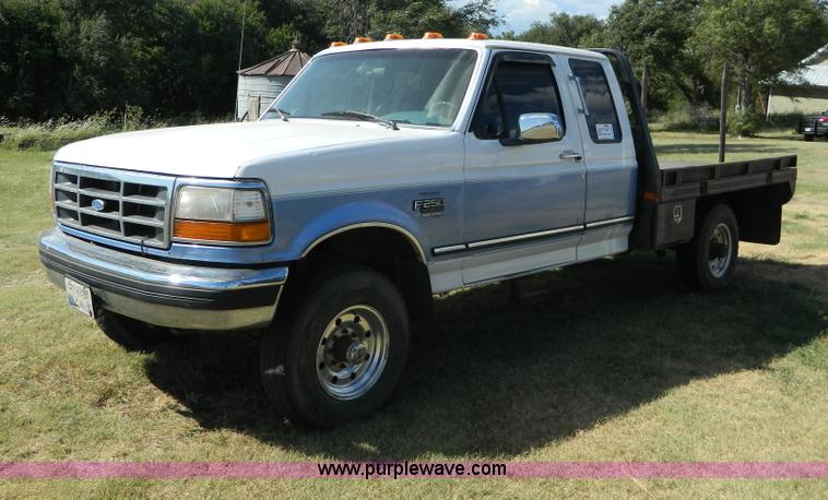 image for item D6034 1996 Ford F250 XL SuperCab flatbed truck