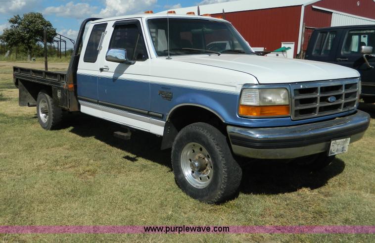 image for item D6034 1996 Ford F250 XL SuperCab flatbed truck