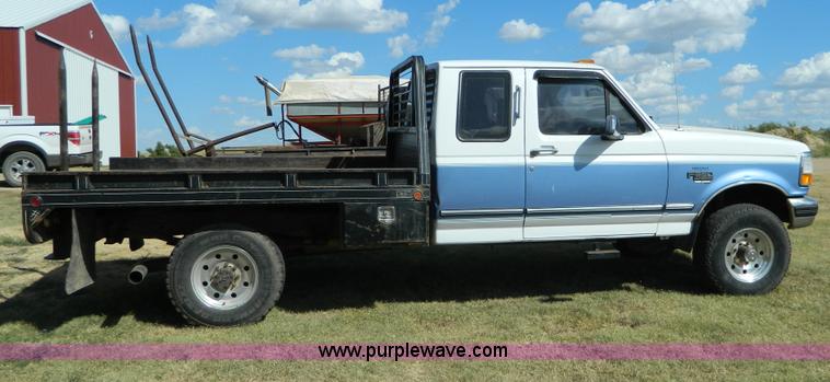 image for item D6034 1996 Ford F250 XL SuperCab flatbed truck