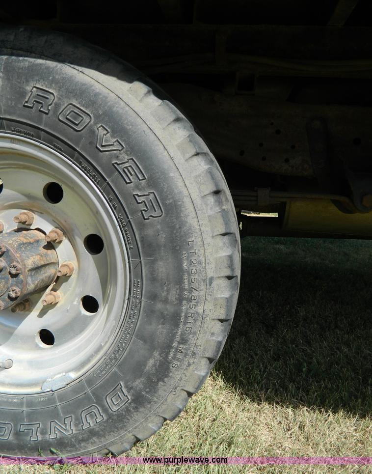 image for item D6034 1996 Ford F250 XL SuperCab flatbed truck