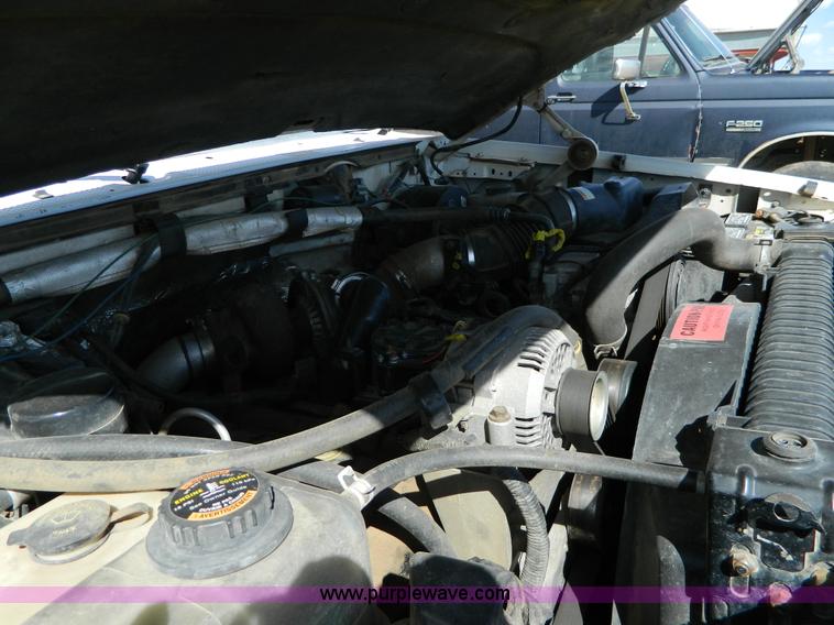 image for item D6034 1996 Ford F250 XL SuperCab flatbed truck