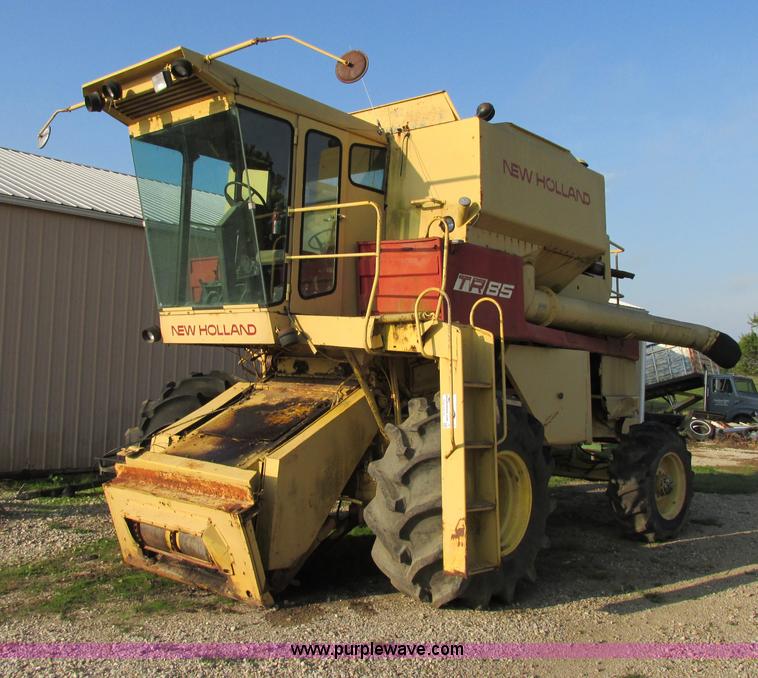 image for item F5297 1981 New Holland TR85 RWA combine with header