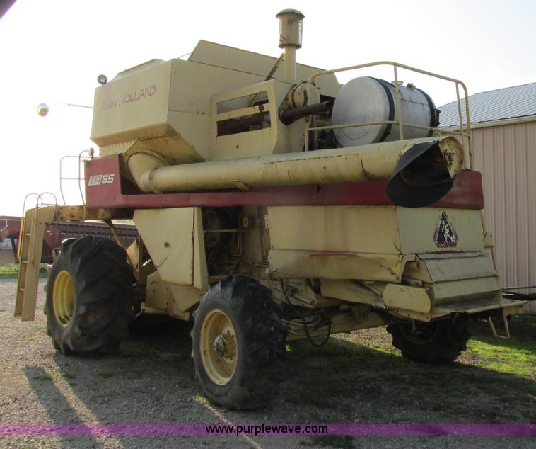image for item F5297 1981 New Holland TR85 RWA combine with header