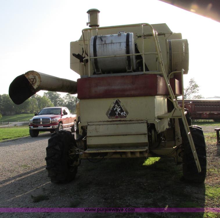 image for item F5297 1981 New Holland TR85 RWA combine with header