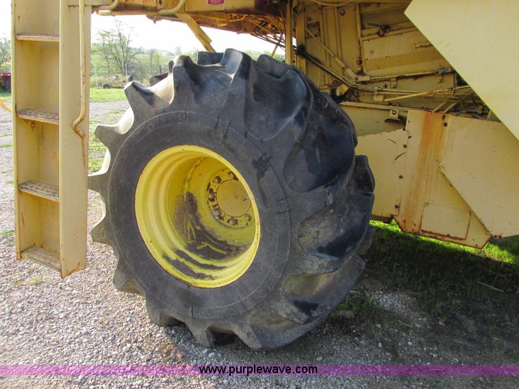 image for item F5297 1981 New Holland TR85 RWA combine with header