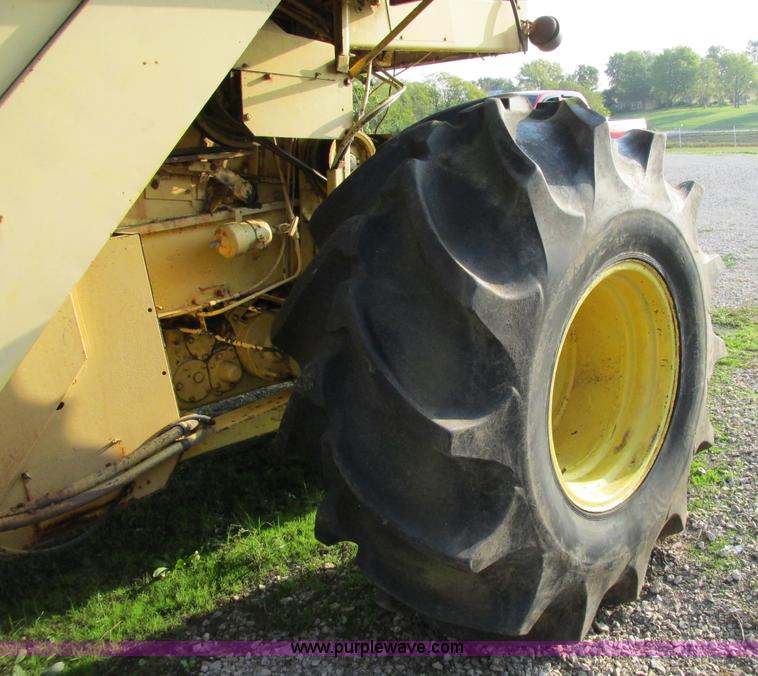 image for item F5297 1981 New Holland TR85 RWA combine with header