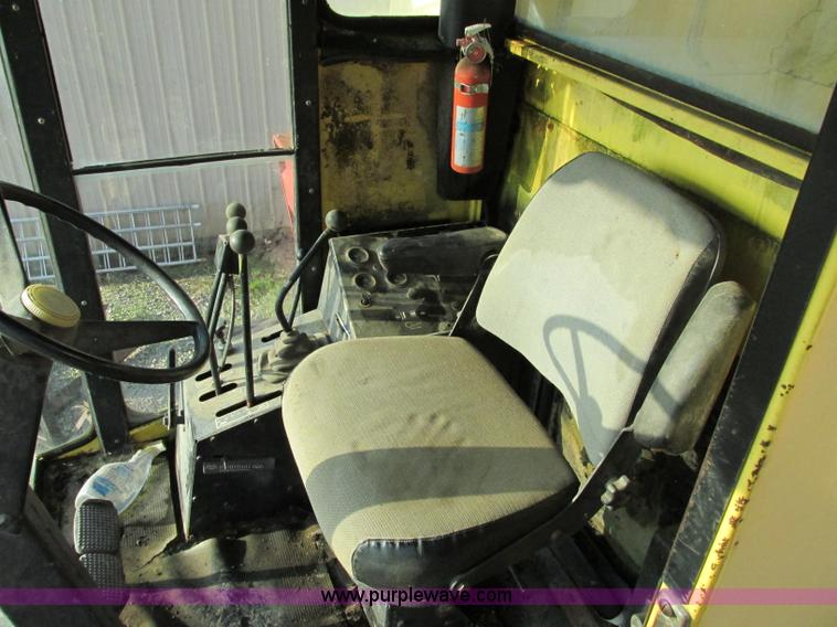 image for item F5297 1981 New Holland TR85 RWA combine with header