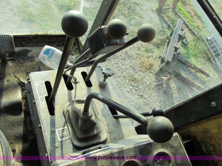 image for item F5297 1981 New Holland TR85 RWA combine with header