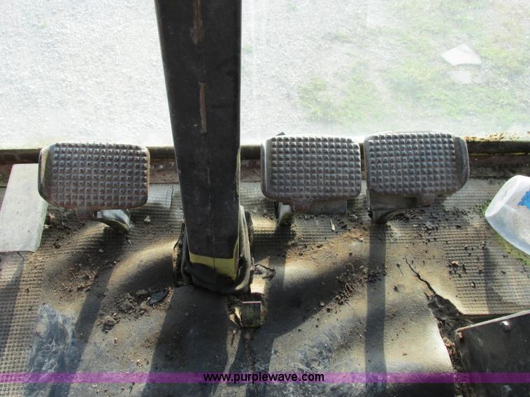 image for item F5297 1981 New Holland TR85 RWA combine with header