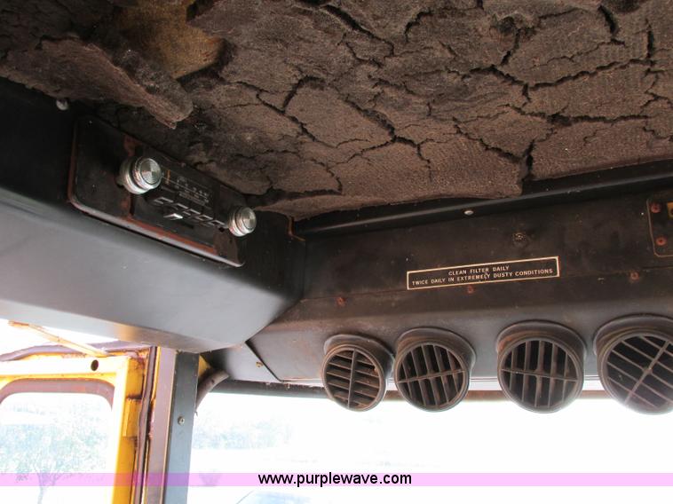 image for item F5297 1981 New Holland TR85 RWA combine with header