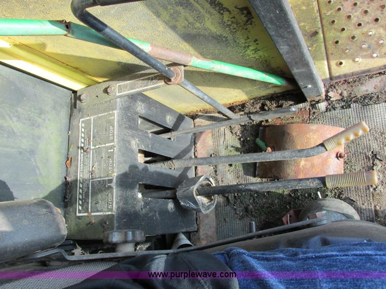 image for item F5297 1981 New Holland TR85 RWA combine with header