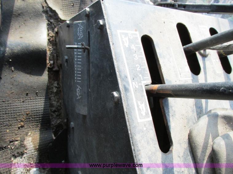 image for item F5297 1981 New Holland TR85 RWA combine with header