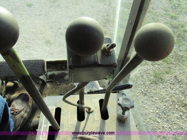 image for item F5297 1981 New Holland TR85 RWA combine with header