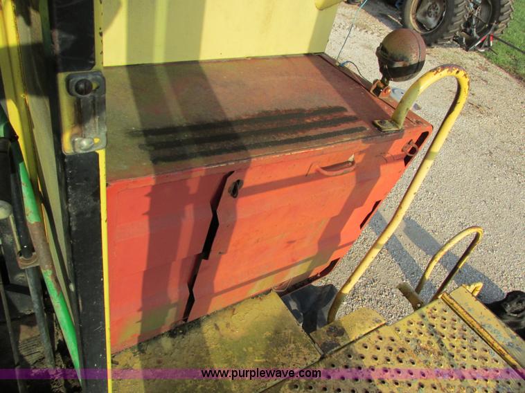 image for item F5297 1981 New Holland TR85 RWA combine with header