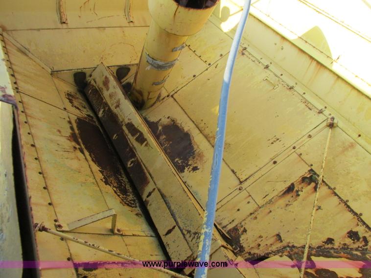 image for item F5297 1981 New Holland TR85 RWA combine with header